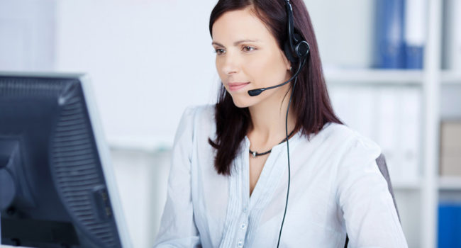 An image which shows a transcriptionist in the process of rendering transcription services